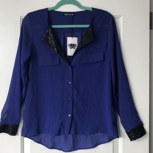 Purple and black Double Zero blouse.